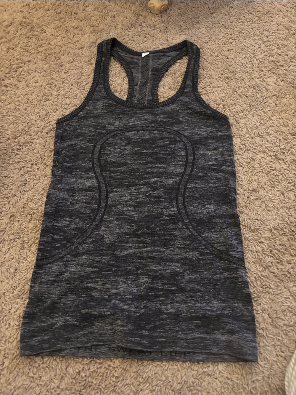 NWOTLululemon size4  Racerback Top Heather Charcoal. SIZE TAG GONE